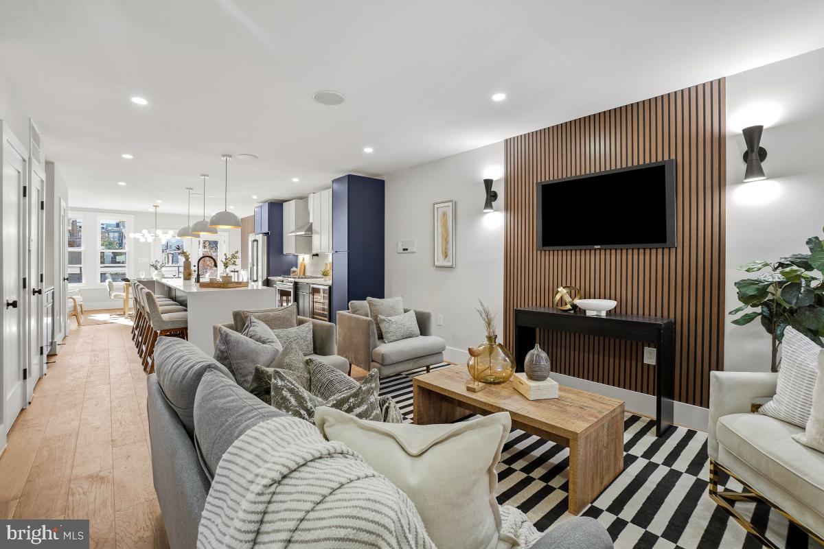1621 D Street Northeast Washington, DC 20002 - Photo 7 of 31 a living room with furniture and a flat screen tv