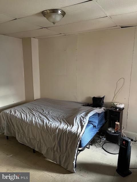 1022 North Lime Street Lancaster, PA 17602 - Photo 3 of 4 a bedroom with a bed and a ceiling fan