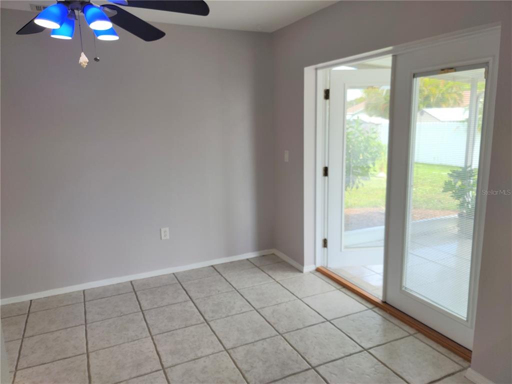 979 Nantucket Road Venice, FL 34293 - Photo 15 of 34 a view of an empty room with a window