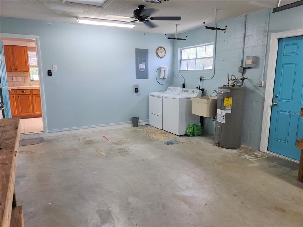 979 Nantucket Road Venice, FL 34293 - Photo 32 of 34 a view of a storage & utility room with a sink