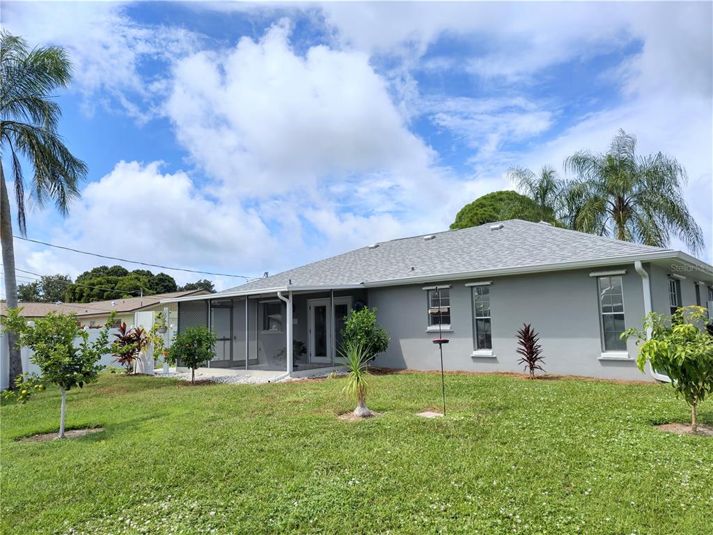 979 Nantucket Road Venice, FL 34293 - Photo 34 of 34 a house view with a garden space