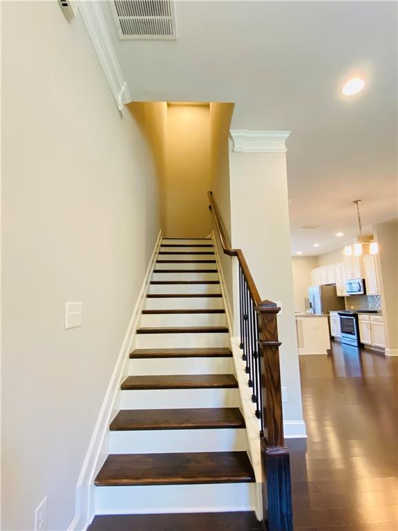 1815 Hislop Lane, Unit 8 Atlanta, GA 30345 - Photo 14 of 38 a view of entryway and hall with wooden floor