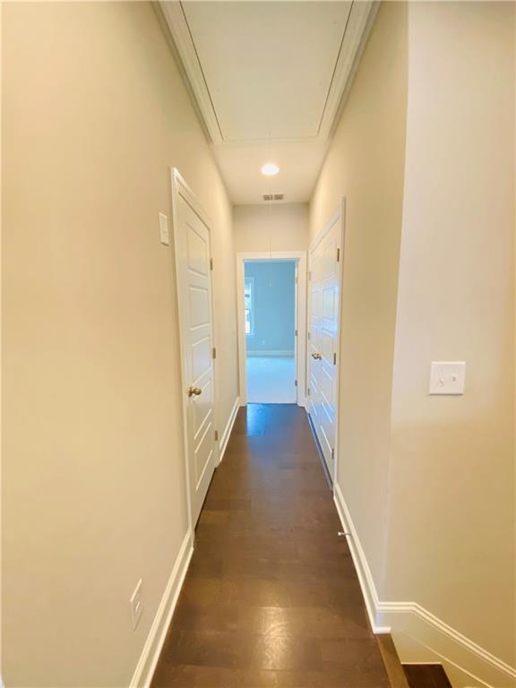 1815 Hislop Lane, Unit 8 Atlanta, GA 30345 - Photo 15 of 38 a view of a hallway with wooden floor
