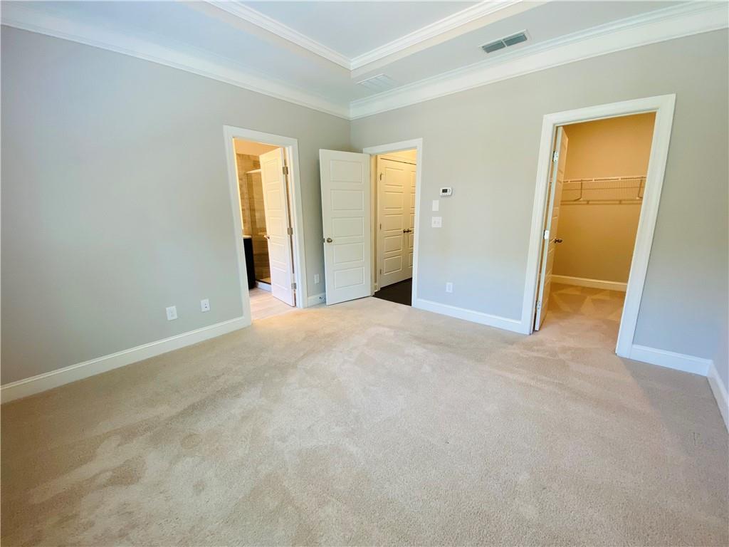 1815 Hislop Lane, Unit 8 Atlanta, GA 30345 - Photo 17 of 38 an empty room with windows and closet