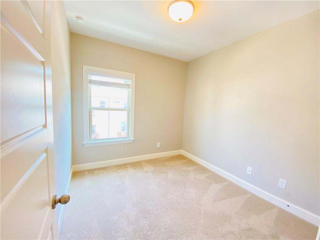 1815 Hislop Lane, Unit 8 Atlanta, GA 30345 - Photo 26 of 38 a view of an empty room with a window