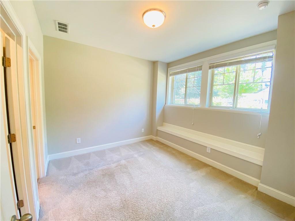 1815 Hislop Lane, Unit 8 Atlanta, GA 30345 - Photo 31 of 38 a view of an empty room with a window