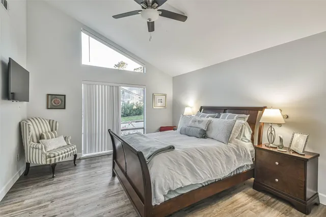 a bedroom with a bed and a couch