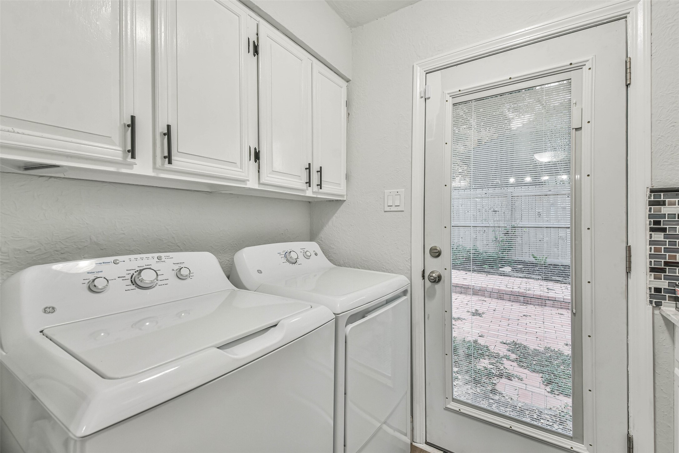 50 April Village Conroe, TX 77356 - Photo 16 of 19 a utility room with dryer and washer