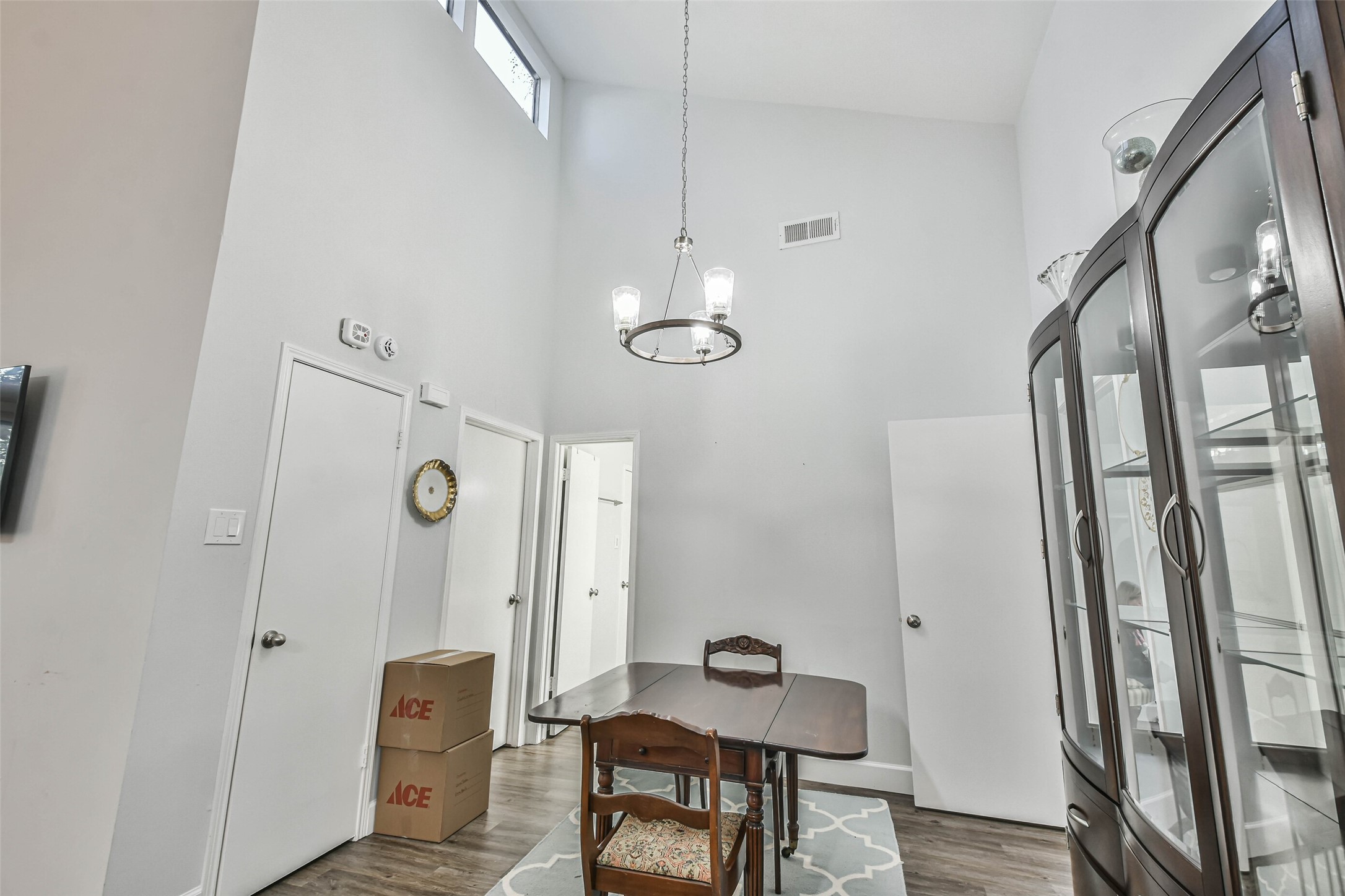 50 April Village Conroe, TX 77356 - Photo 10 of 19 a view of a room with furniture and wooden floor