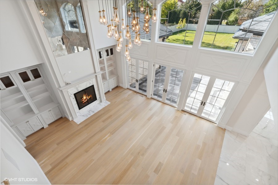 502 Greenwood Road Northbrook, IL 60062 - Photo 12 of 60 a view of a living room with furniture and a fireplace