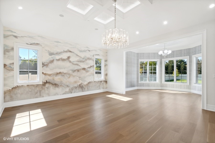 502 Greenwood Road Northbrook, IL 60062 - Photo 29 of 60 an empty room with wooden floor and large windows
