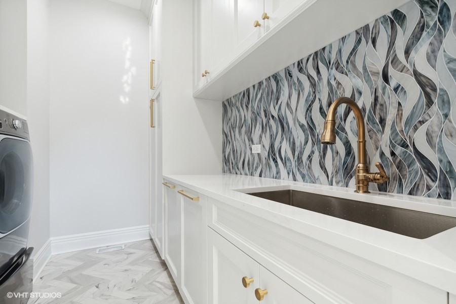 502 Greenwood Road Northbrook, IL 60062 - Photo 41 of 60 a view of a utility room with sink