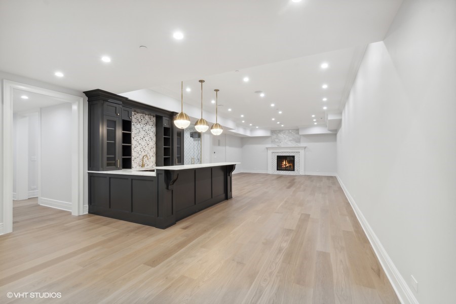 502 Greenwood Road Northbrook, IL 60062 - Photo 45 of 60 a large kitchen with a large counter top and a sink