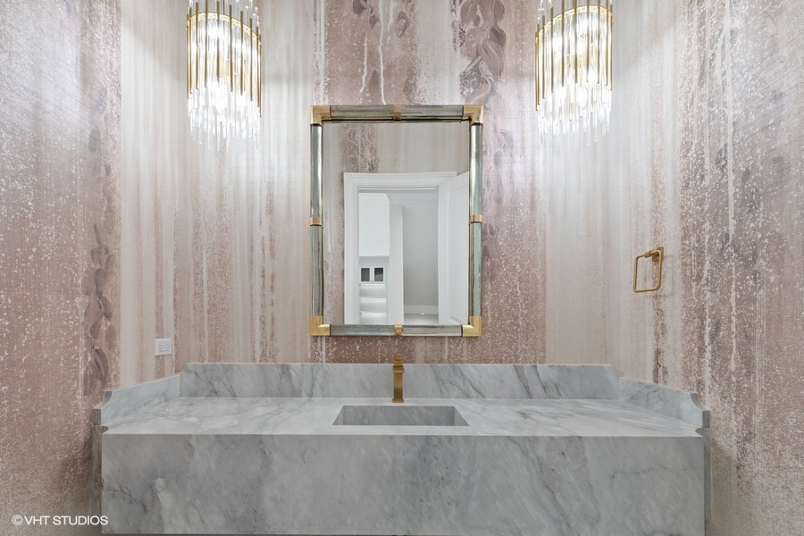 502 Greenwood Road Northbrook, IL 60062 - Photo 9 of 60 a bathroom with a granite countertop sink and a mirror