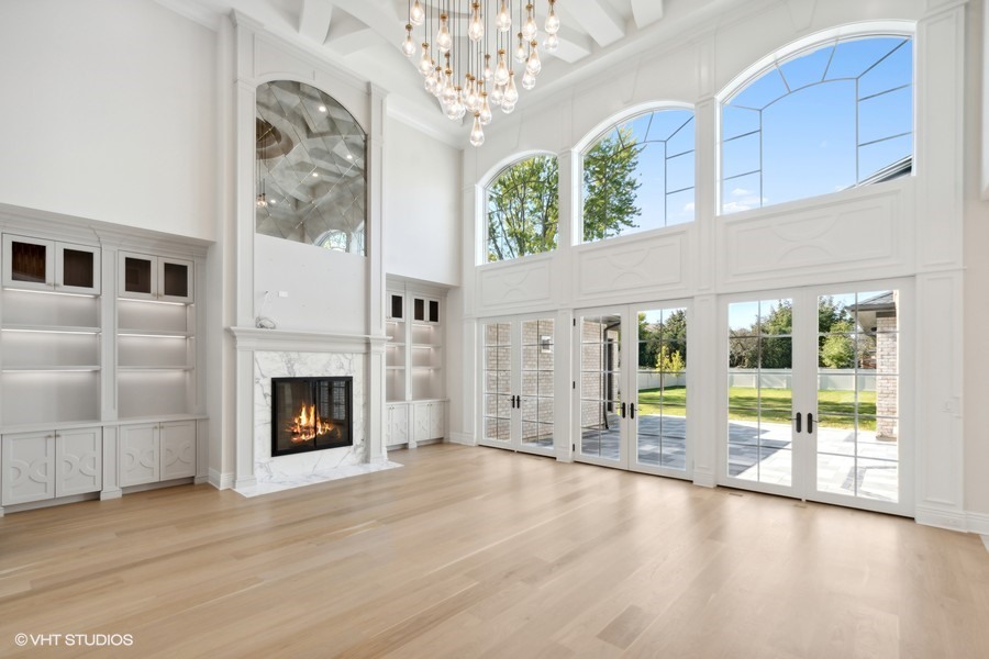 502 Greenwood Road Northbrook, IL 60062 - Photo 10 of 60 a view of an empty room with a fireplace and a window