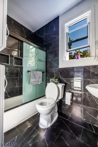 a view of a backyard with sitting area and furniture