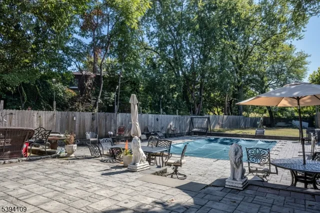 a view of swimming pool with garden