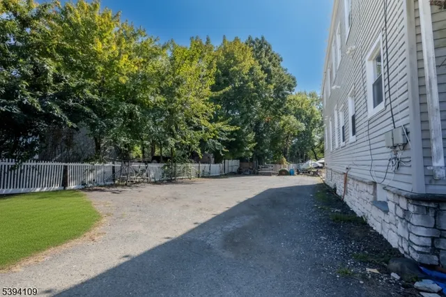 a view of a living room and a livingroom with furniture