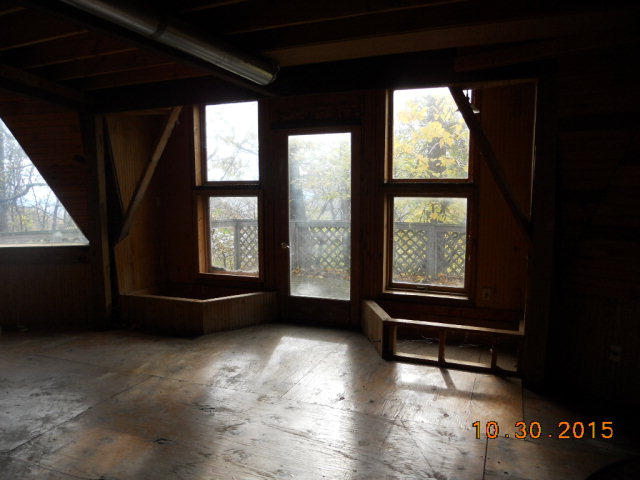 483 Griffith Hill Road Ferrum, VA 24088 - Photo 12 of 17 a living room with furniture and a window