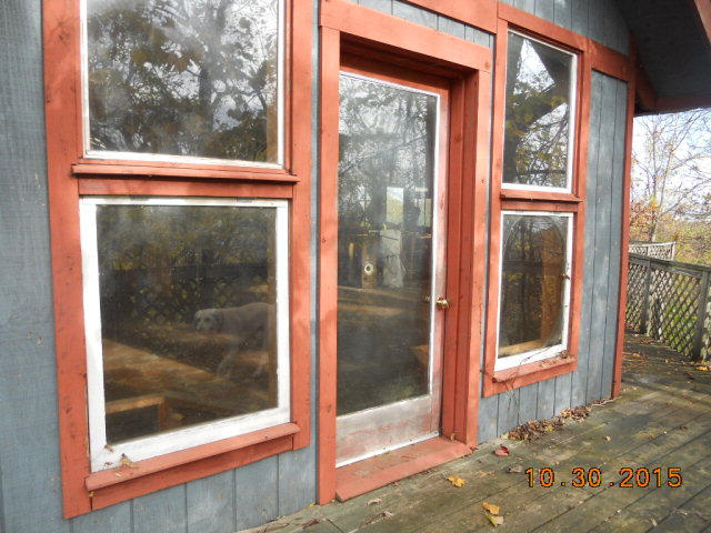483 Griffith Hill Road Ferrum, VA 24088 - Photo 15 of 17 a view of a glass door with a red gate