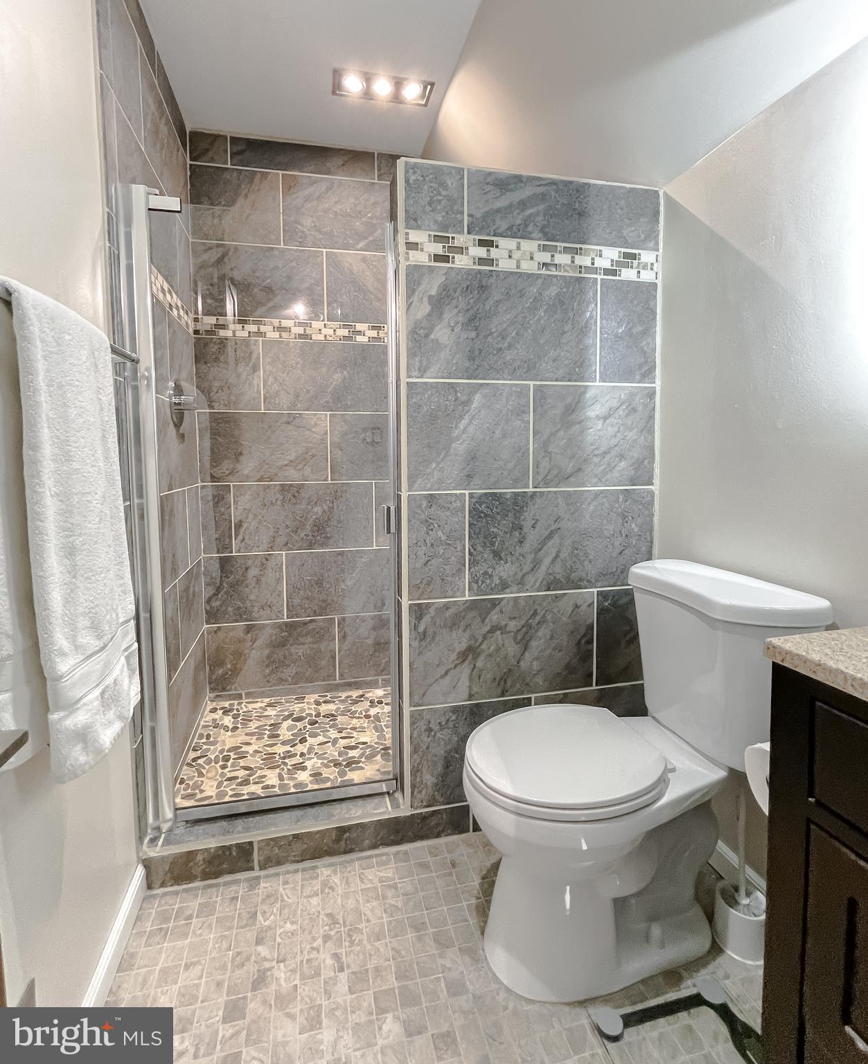 3743 8th Street North Beach, MD 20714 - Photo 17 of 62 Upstairs bath w/ bluetooth mirror and LED lighting