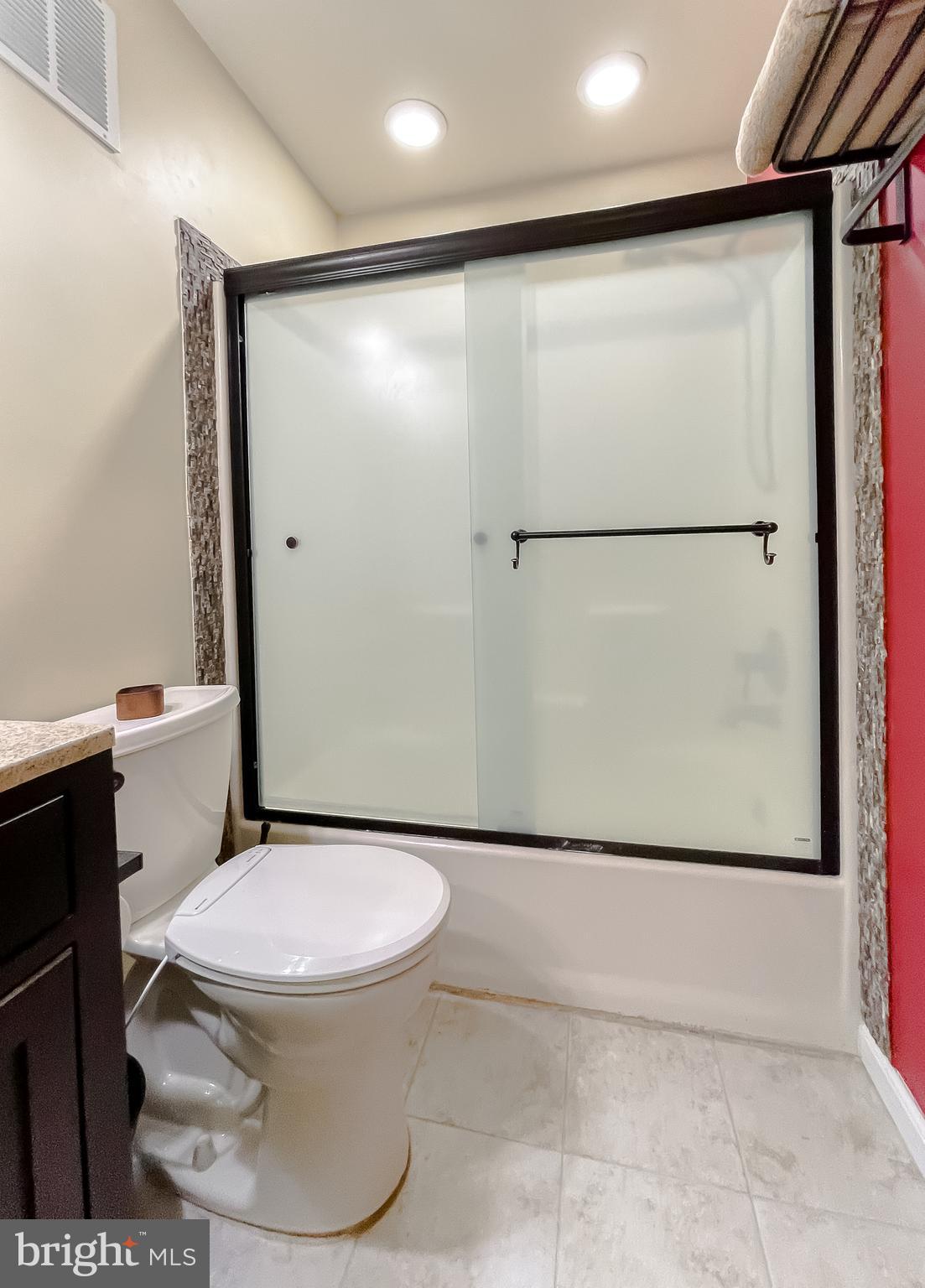 3743 8th Street North Beach, MD 20714 - Photo 19 of 62 Main floor remodeled bathroom