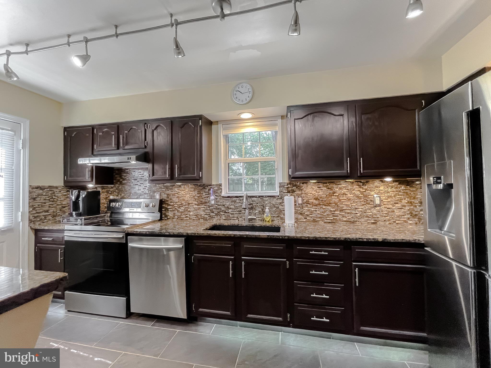 3743 8th Street North Beach, MD 20714 - Photo 25 of 62 Floor and cabinet LED lighting