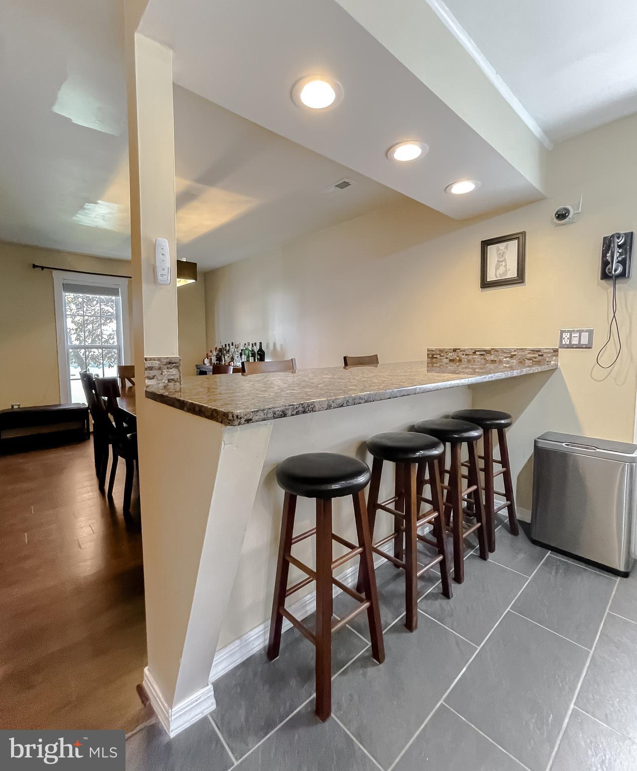 3743 8th Street North Beach, MD 20714 - Photo 30 of 62 Seating for 8 at the bar