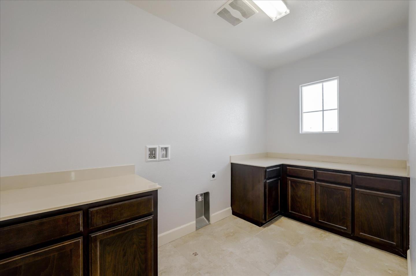 1140 Ruby Way Gilroy, CA 95020 - Photo 47 of 54 a kitchen with a cabinets and window