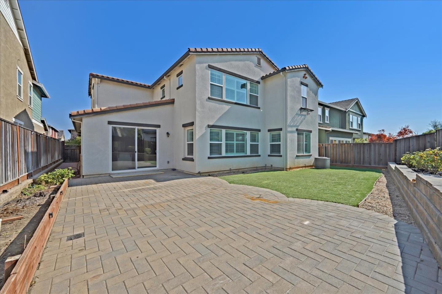 1140 Ruby Way Gilroy, CA 95020 - Photo 50 of 54 a front view of a house with a yard
