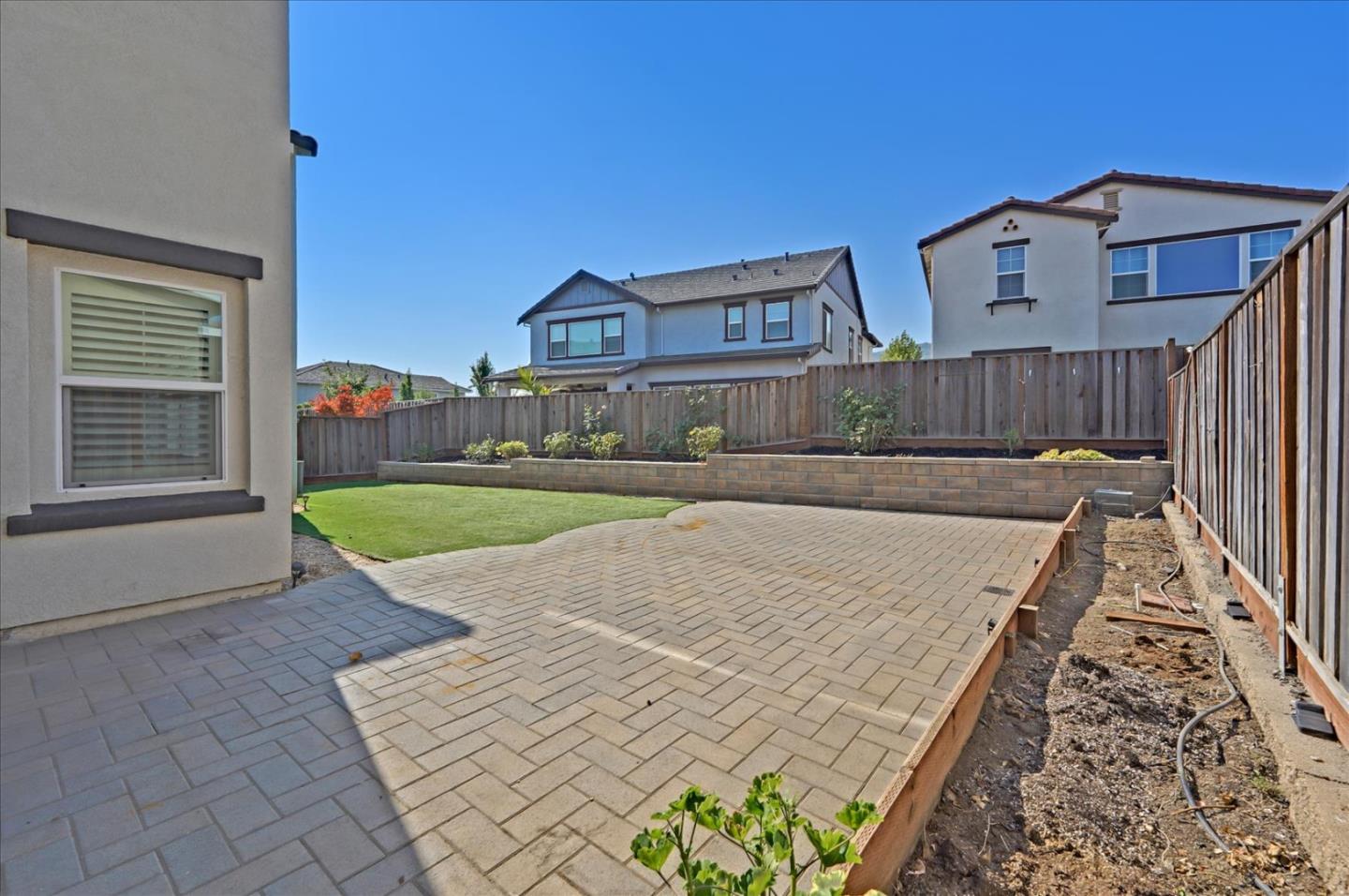1140 Ruby Way Gilroy, CA 95020 - Photo 51 of 54 a view of a house with a yard