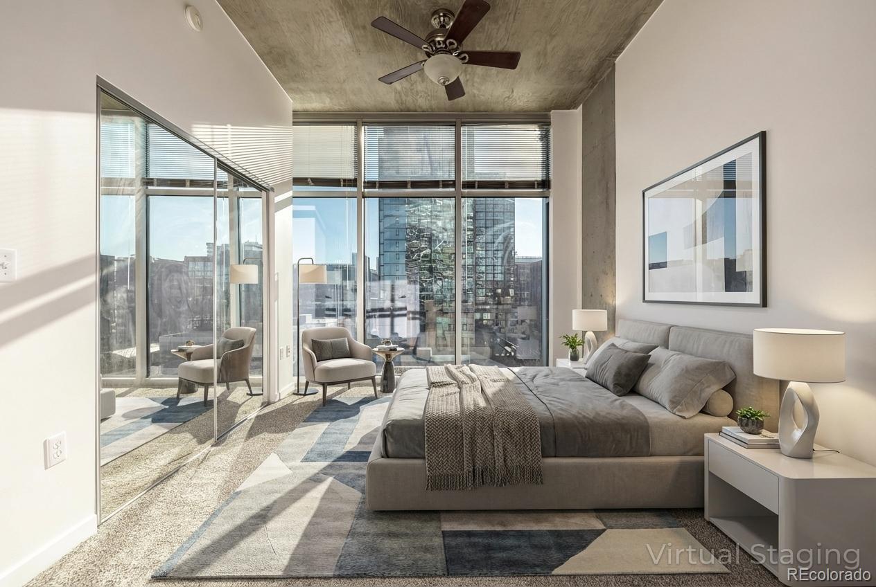 1700 Bassett Street, Unit 1012 Denver, CO 80202 - Photo 2 of 48 a living room with furniture and a large window