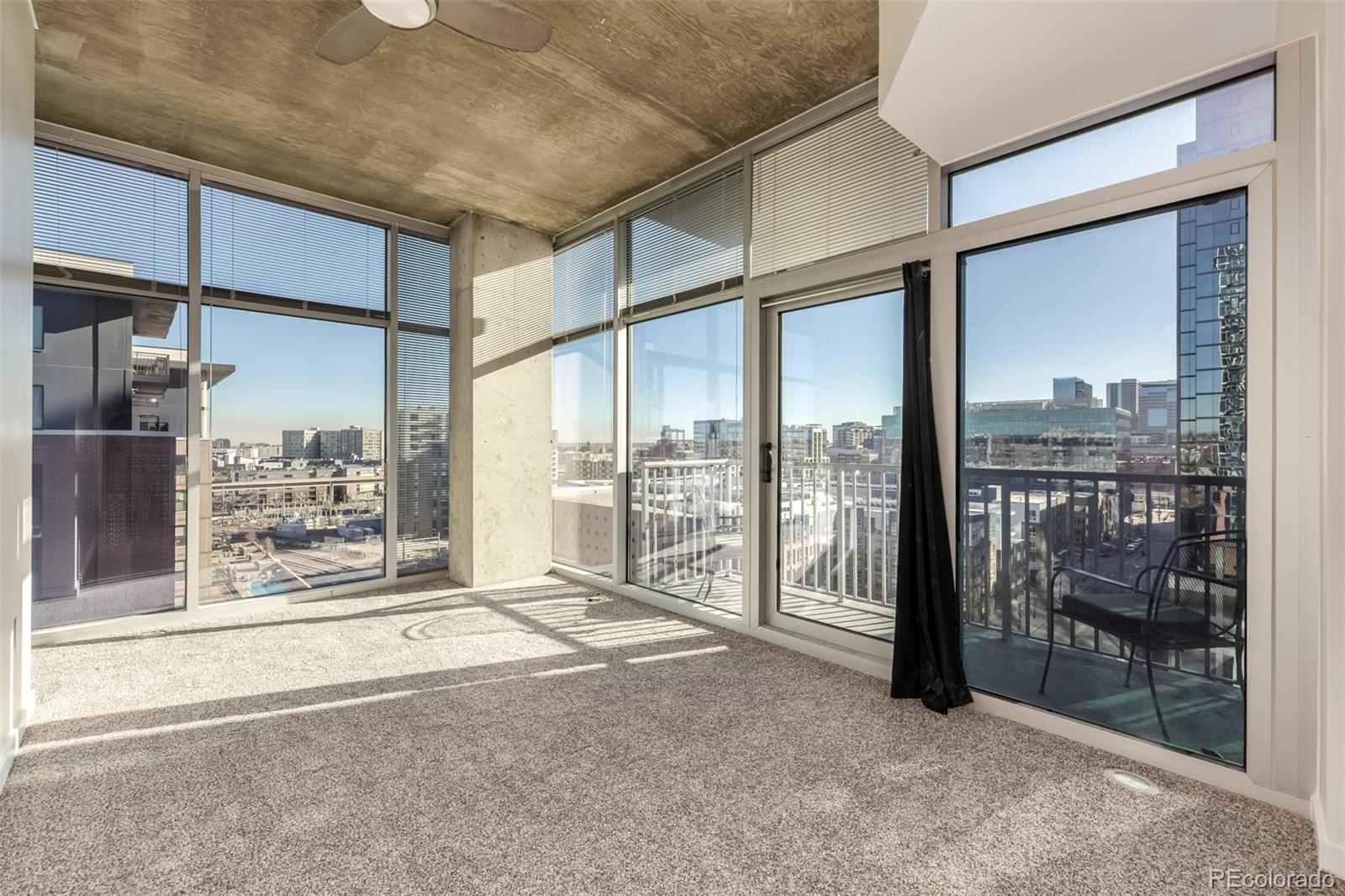 1700 Bassett Street, Unit 1012 Denver, CO 80202 - Photo 24 of 48 a view of an empty room and window