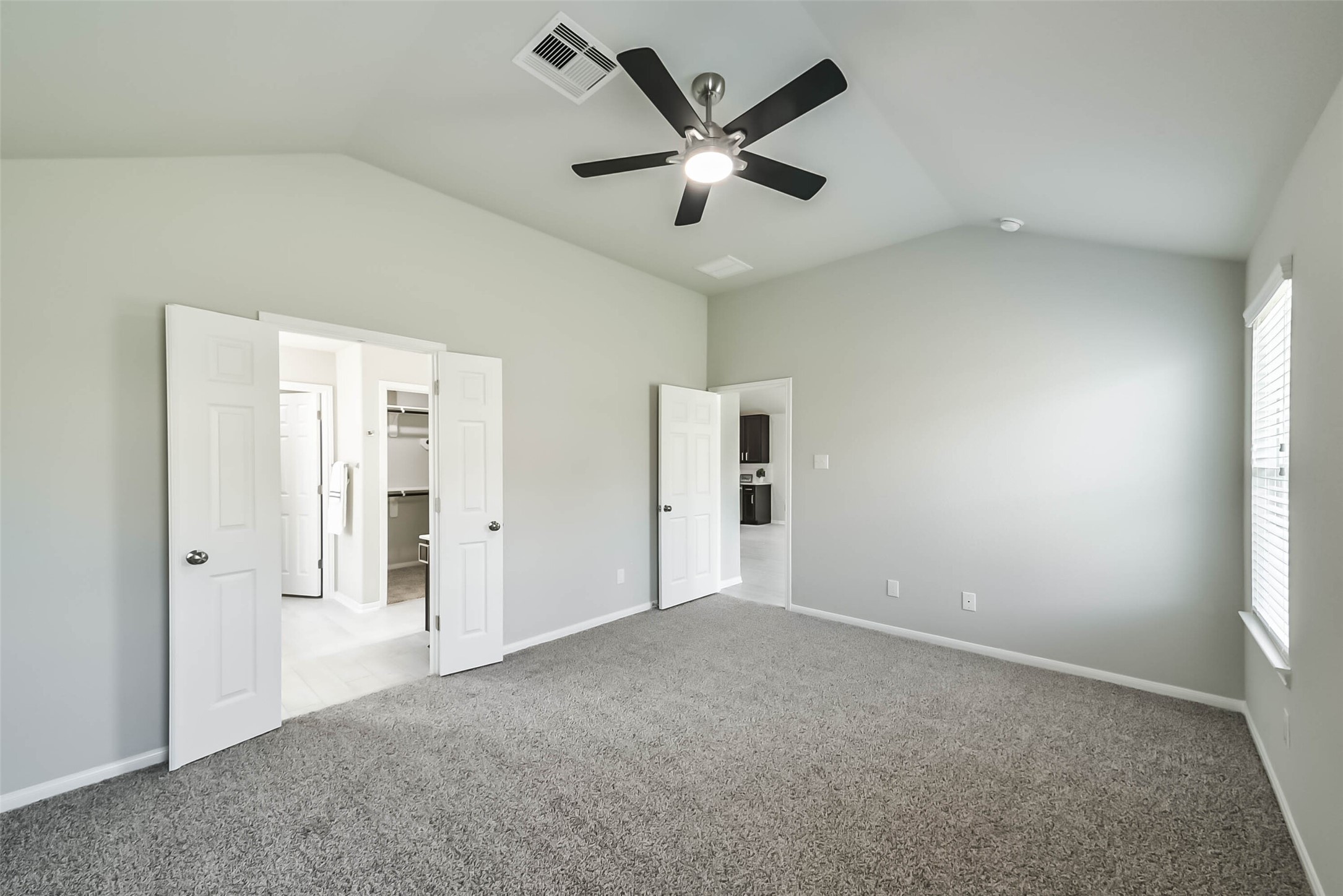 2815 Beech River Court Conroe, TX 77301 - Photo 20 of 34 an empty room with closet and windows