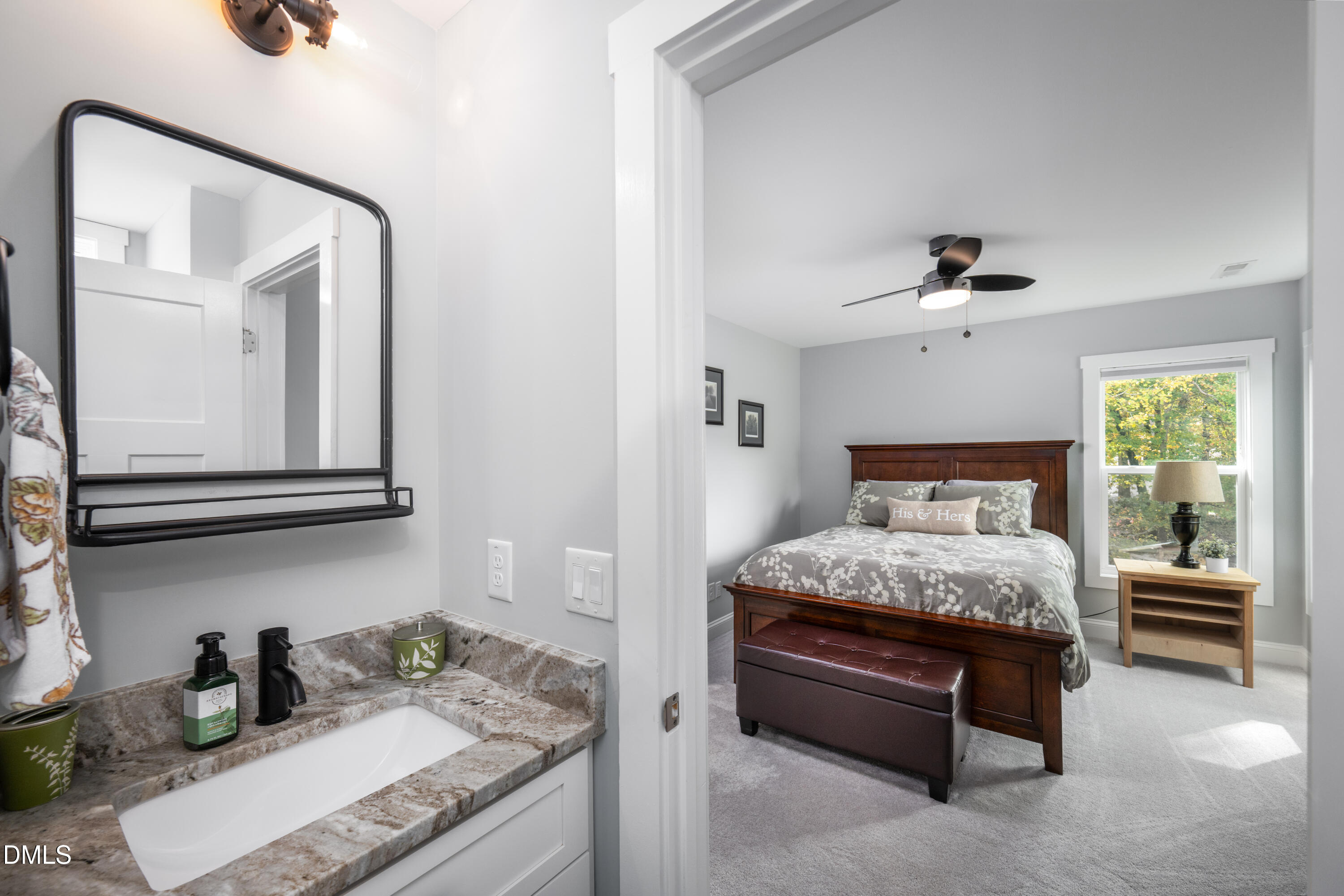 710 Hadley Mill Road Pittsboro, NC 27312 - Photo 34 of 56 a bedroom with a bed and window