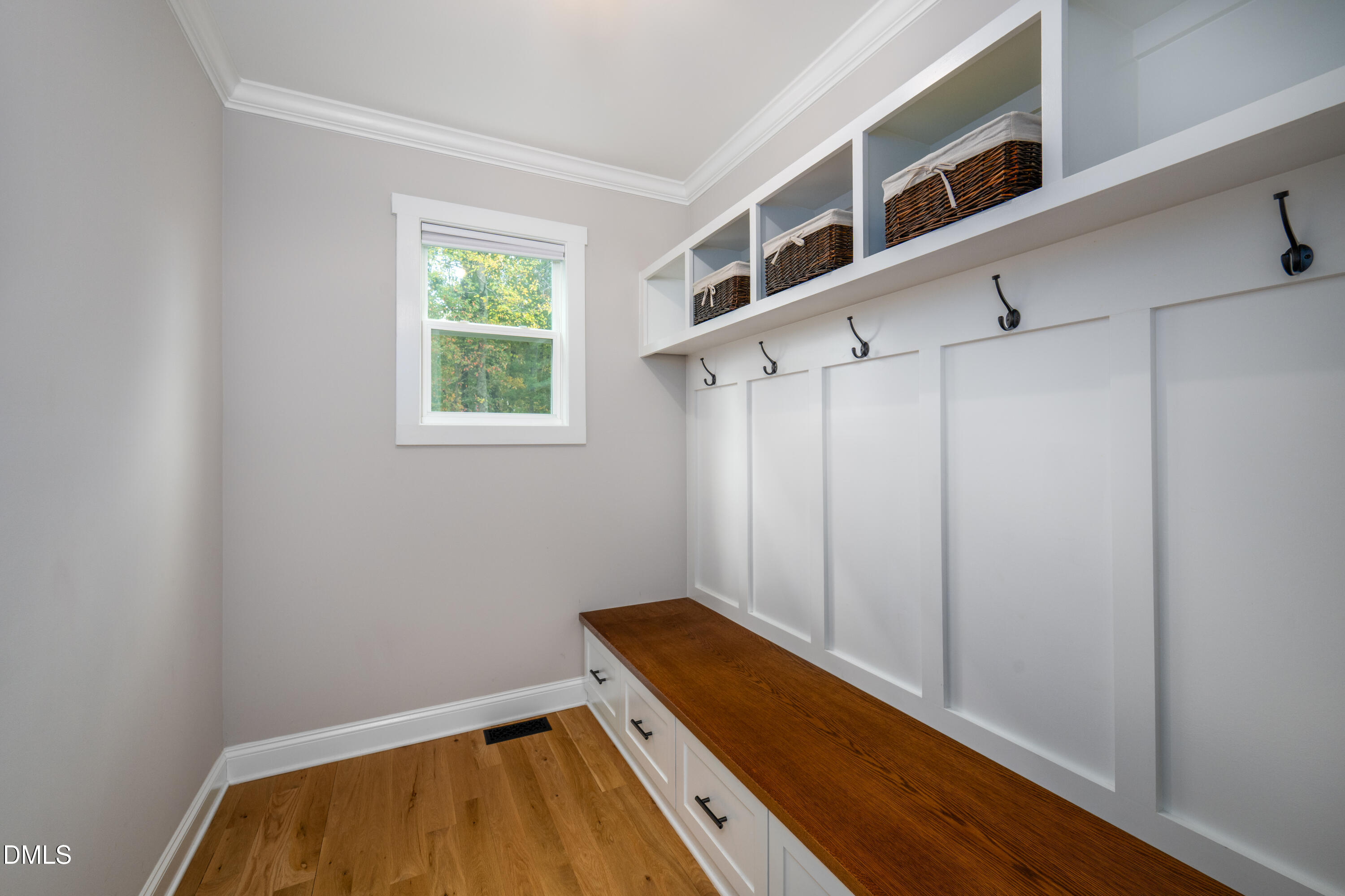 710 Hadley Mill Road Pittsboro, NC 27312 - Photo 35 of 56 a view of a room with wooden floor and a window