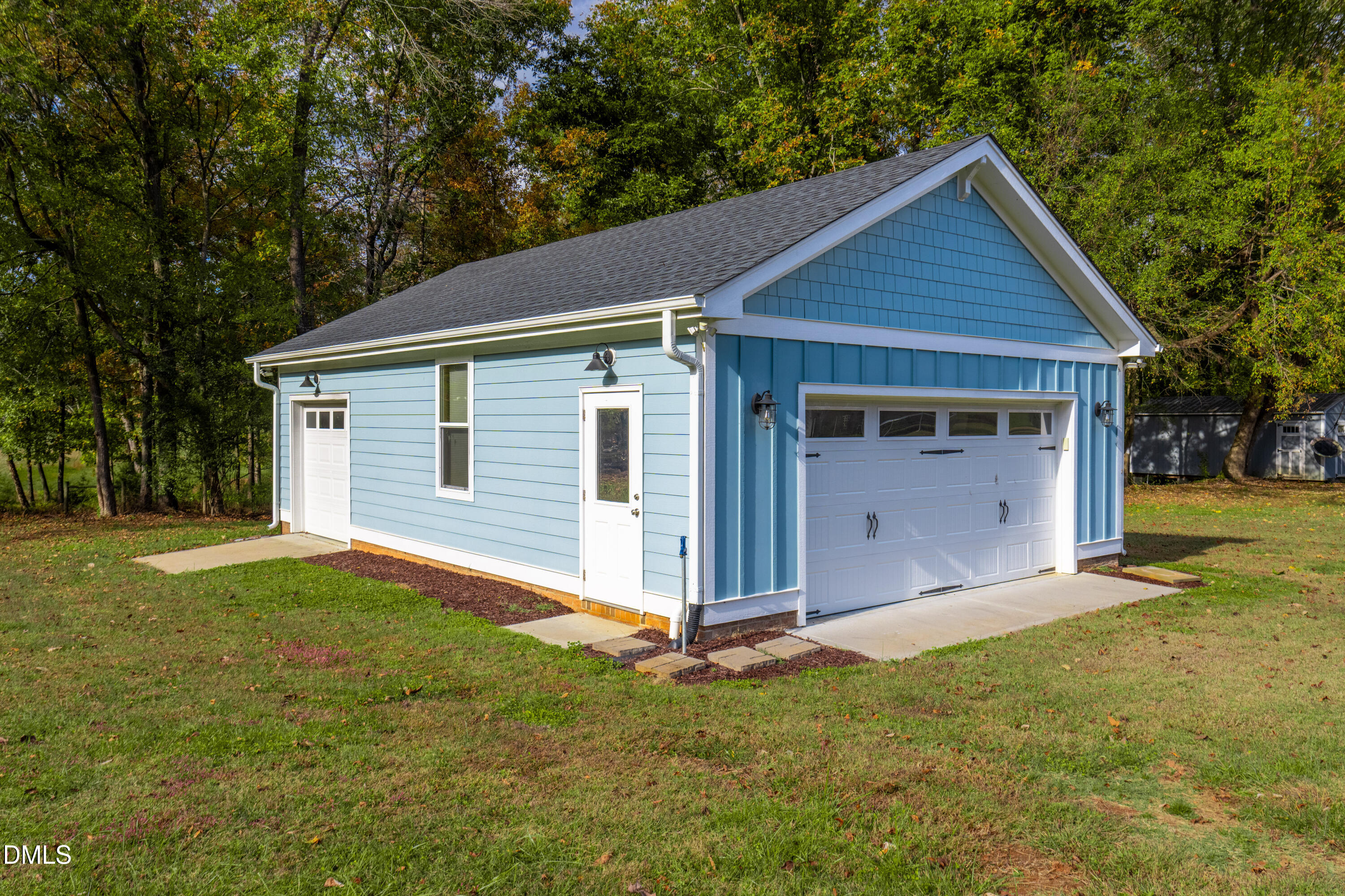710 Hadley Mill Road Pittsboro, NC 27312 - Photo 42 of 56 a view of a house with a yard