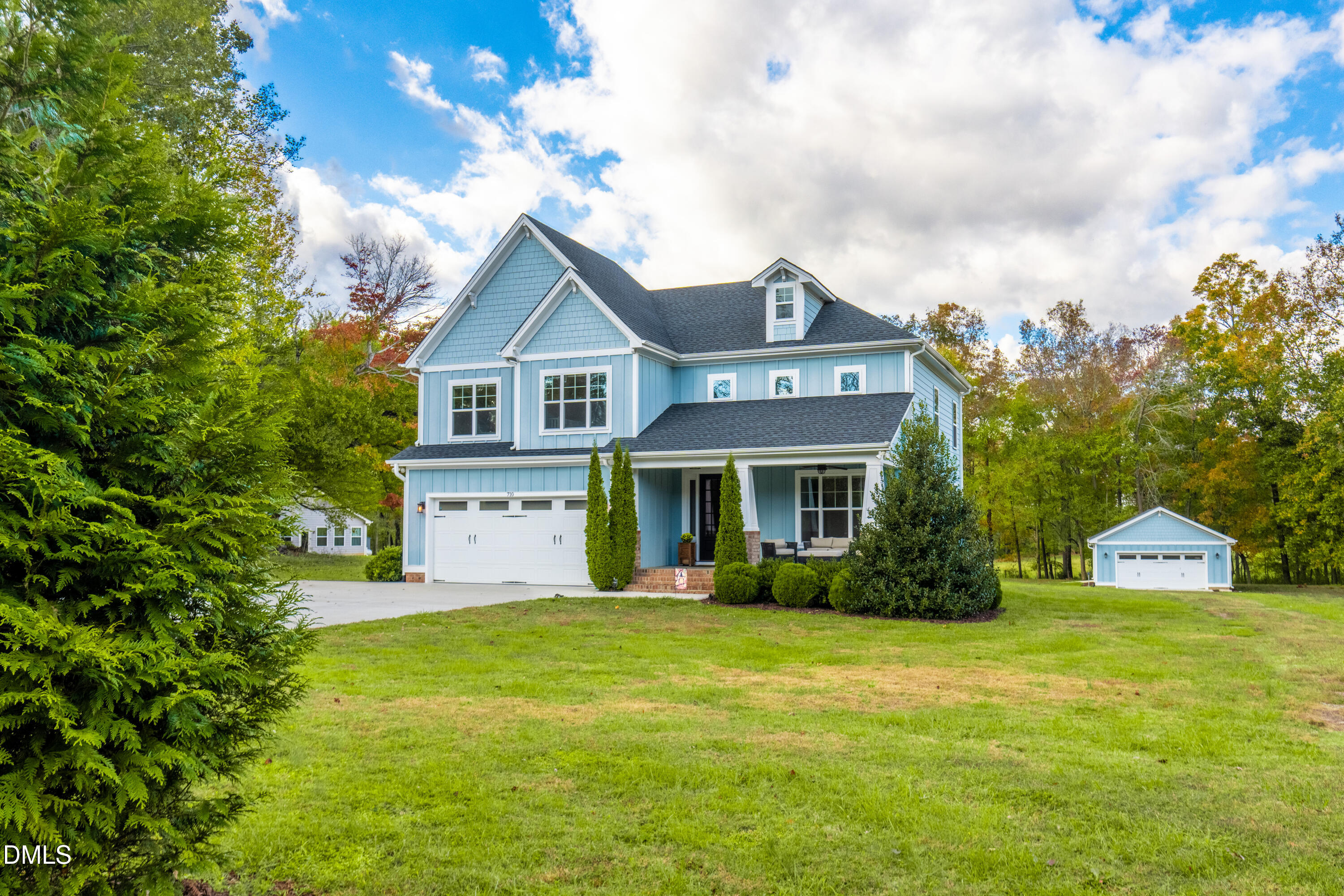 710 Hadley Mill Road Pittsboro, NC 27312 - Photo 47 of 56 a front view of a house with garden