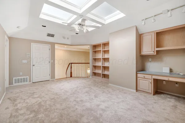 a bathroom with a toilet and a bathtub