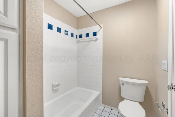 a bathroom with a double vanity sink mirror and shower