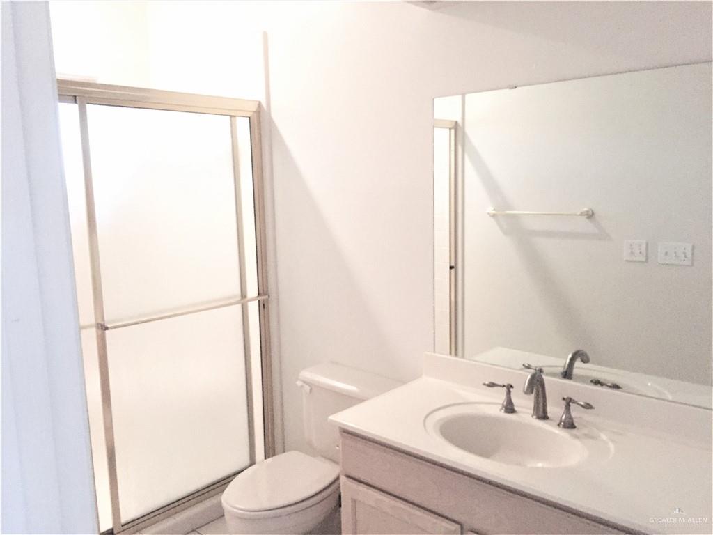 2917 North 43rd Street McAllen, TX 78501 - Photo 12 of 24 a bathroom with a sink toilet and shower