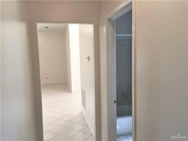 a view of a backyard with sitting area