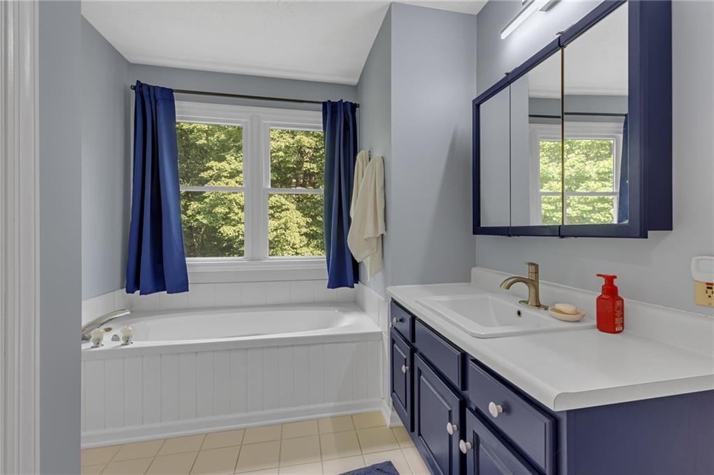 936 Mcelhaney Road Freedom, PA 15042 - Photo 16 of 48 Full bathroom off of the primary bedroom