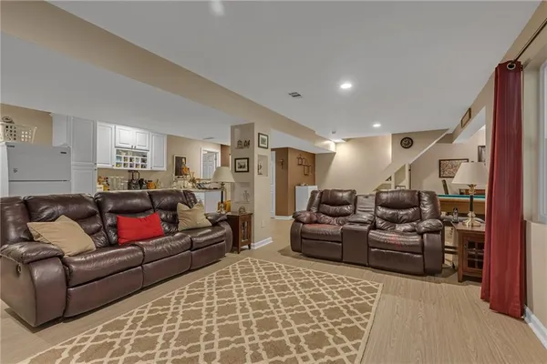 a living room with furniture and a couch