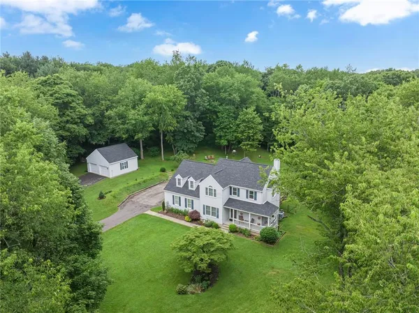 a view of a house with a big yard