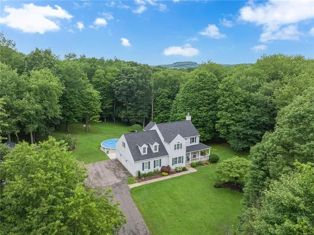 a view of a house with a big yard