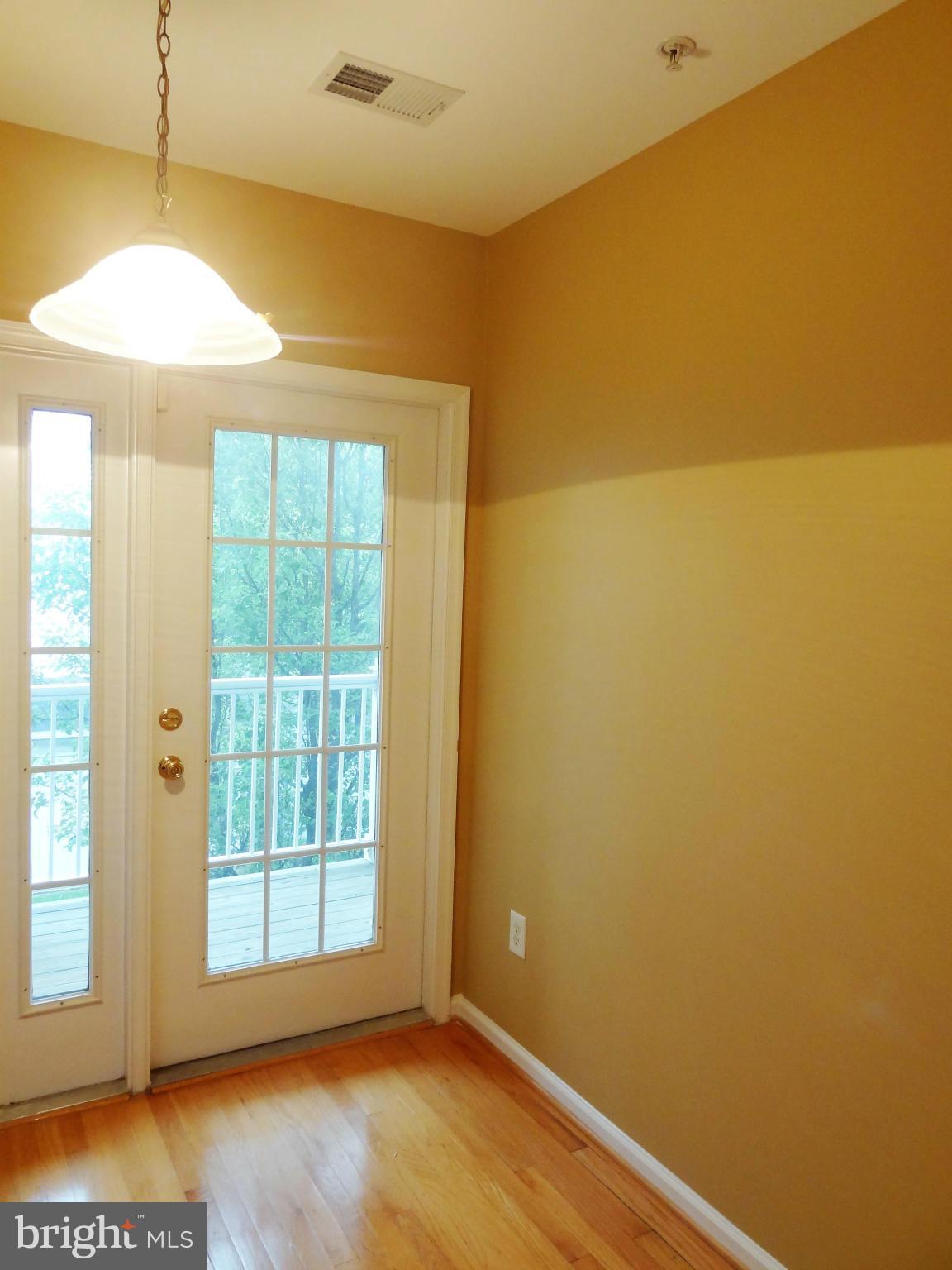 2032 University Boulevard West, Unit 3 Silver Spring, MD 20902 - Photo 6 of 16 a view of an empty room with a window