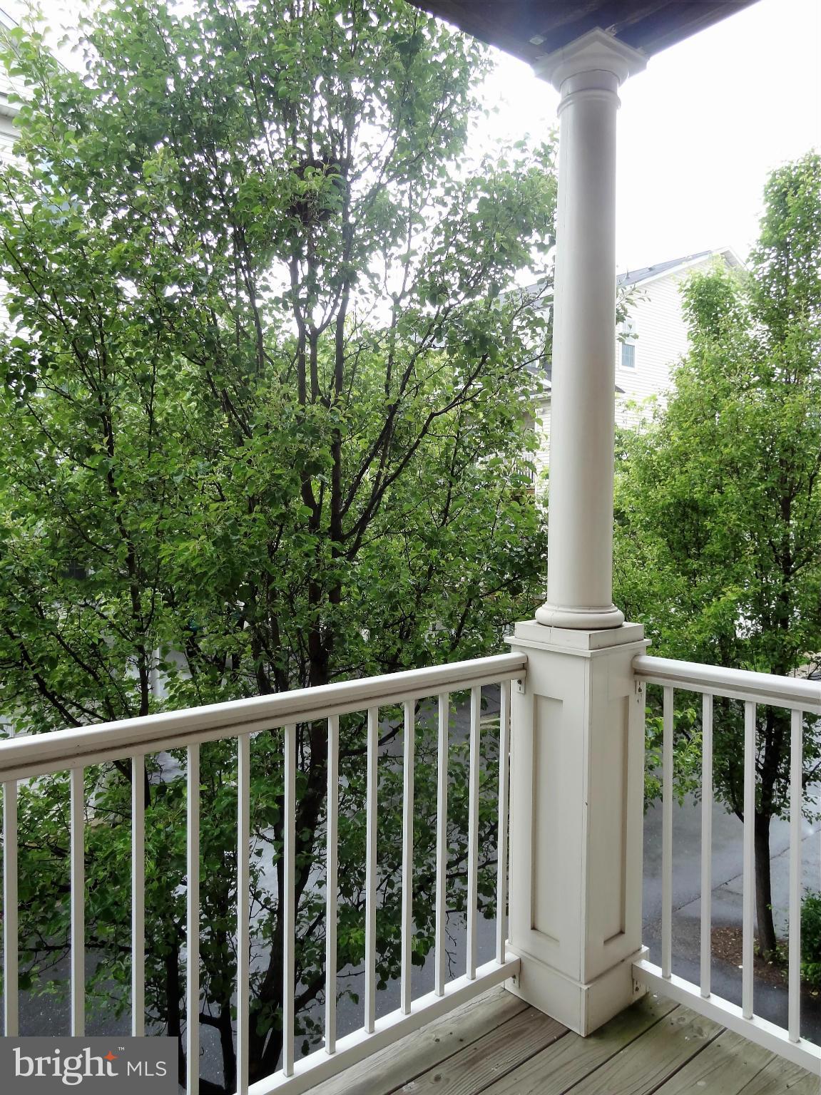 2032 University Boulevard West, Unit 3 Silver Spring, MD 20902 - Photo 7 of 16 a view of a balcony with yard