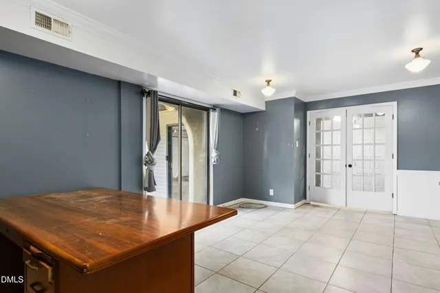 a bedroom with a bed and a cabinets