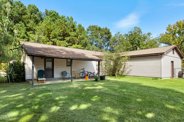 a house view with a garden space